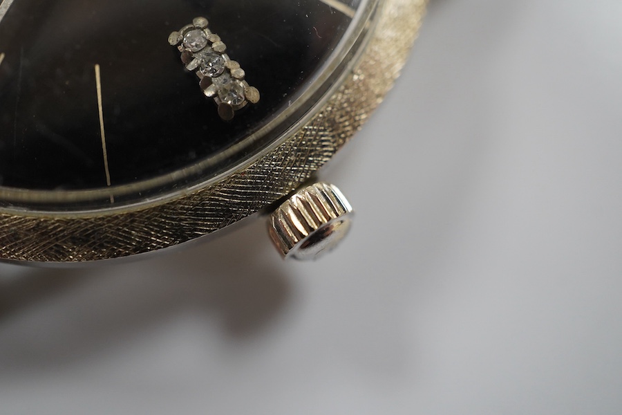 A gentleman's 14kt white metal Jules Jurgensen manual wind wrist watch, with diamond quarterly markers, cased diameter 34mm, on an associated leather strap. Condition - fair to good